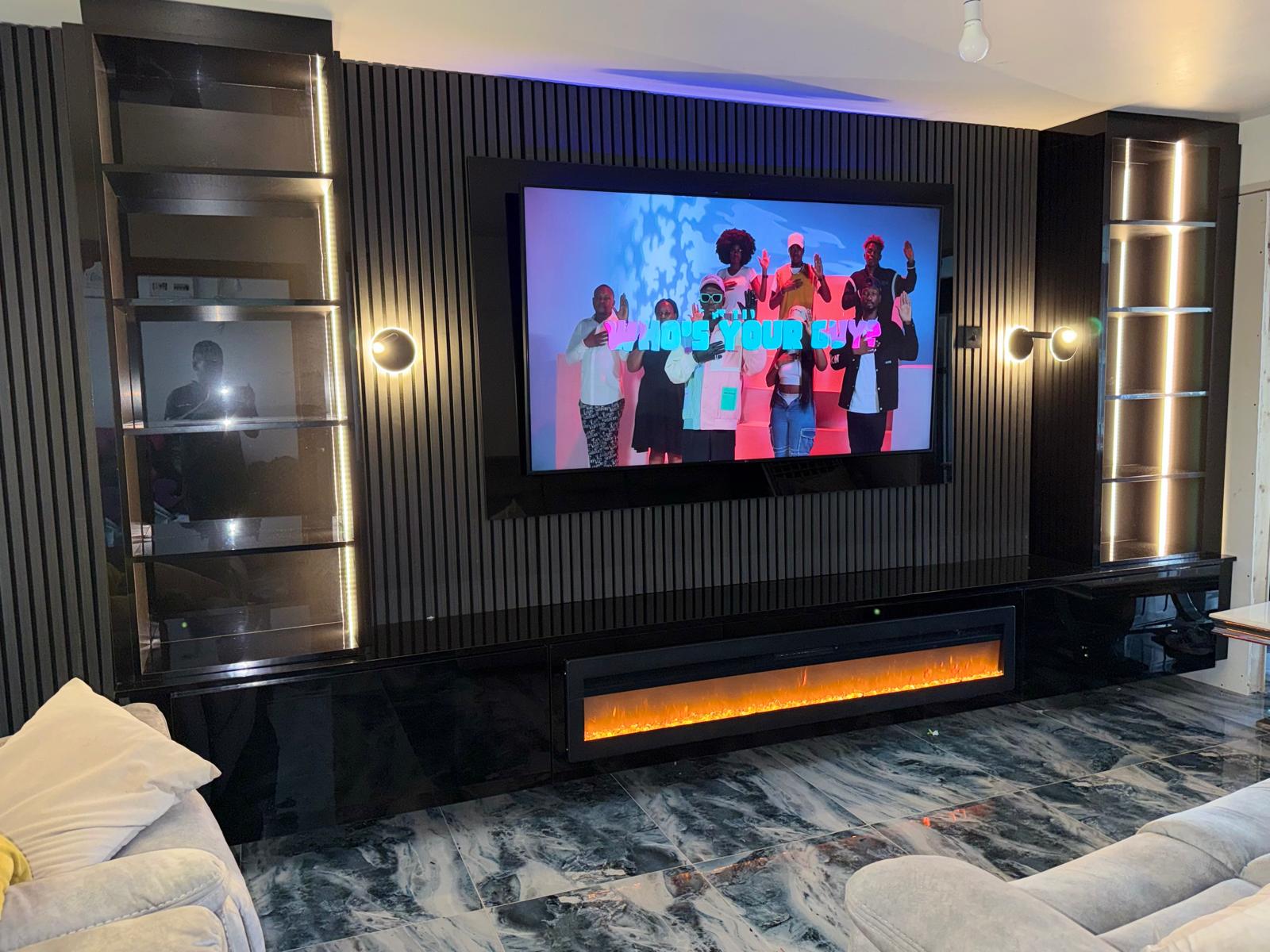 Slatted Media Wall with Linear Fire