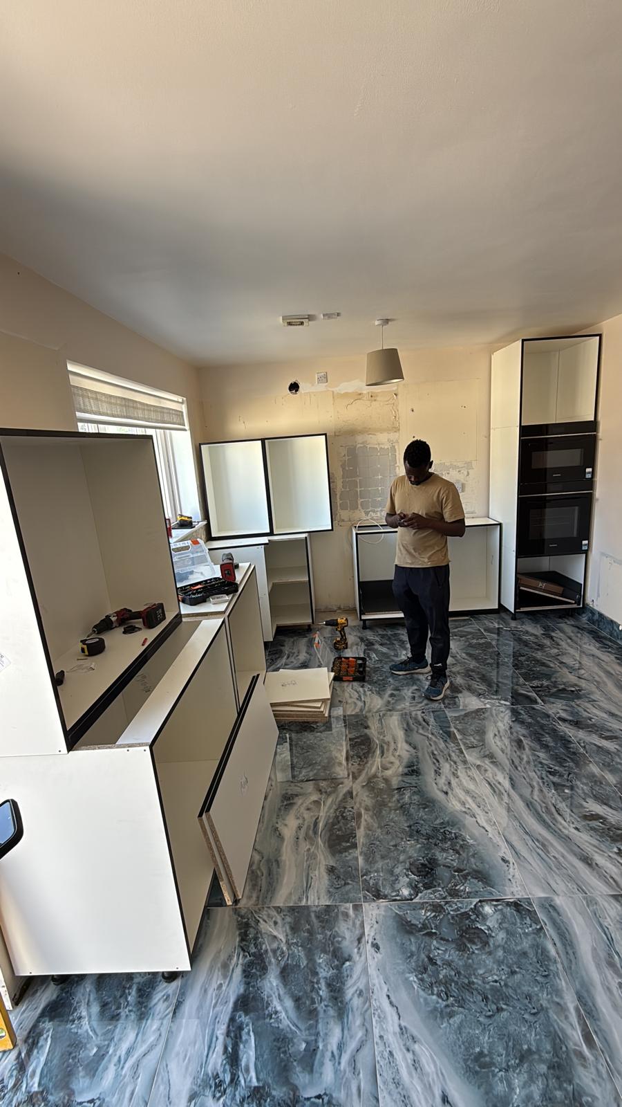 Gloss Cabinetry and Tower Ovens