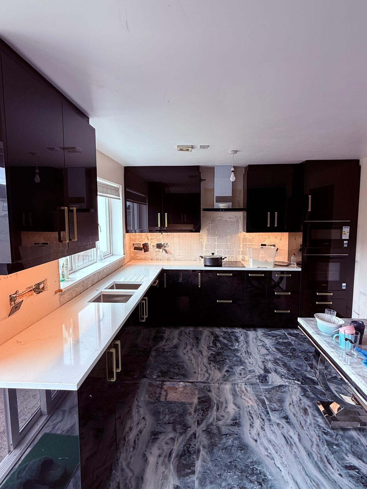U-Shaped Kitchen, Brass Handles and Under-Cabinet Lighting