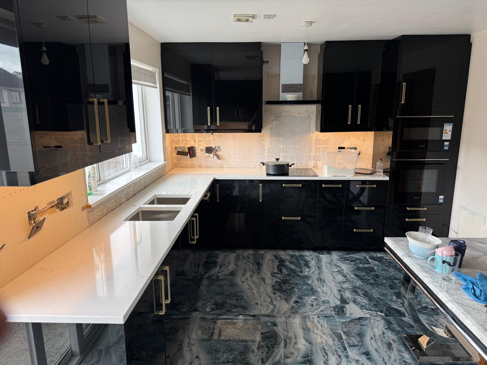 Black Gloss Kitchen with Quartz Worktops