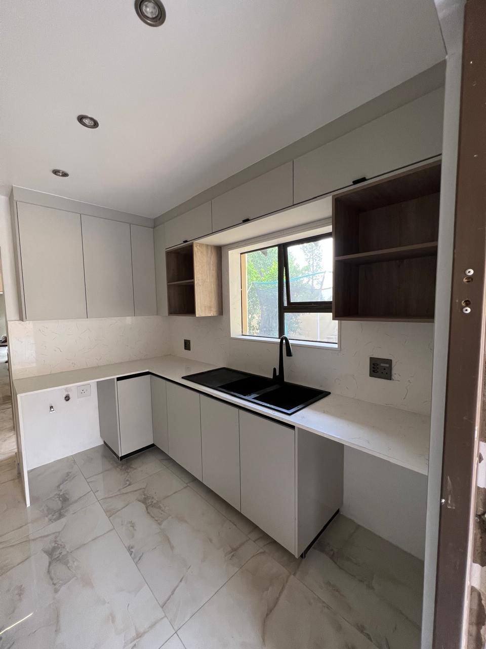 L-Shaped Kitchen with Quartz Worktops