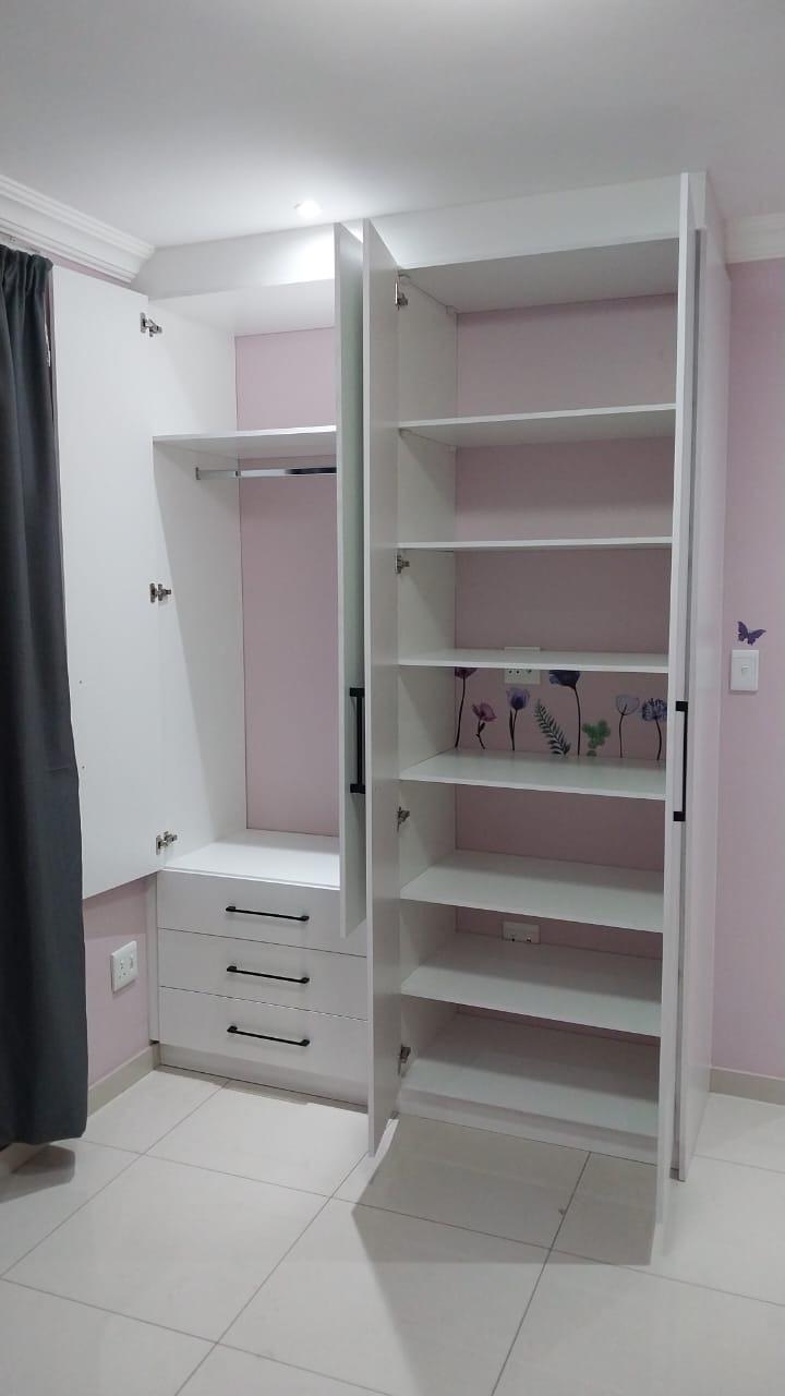 Fitted Bedroom Wardrobe with Drawer Bank and Shelving